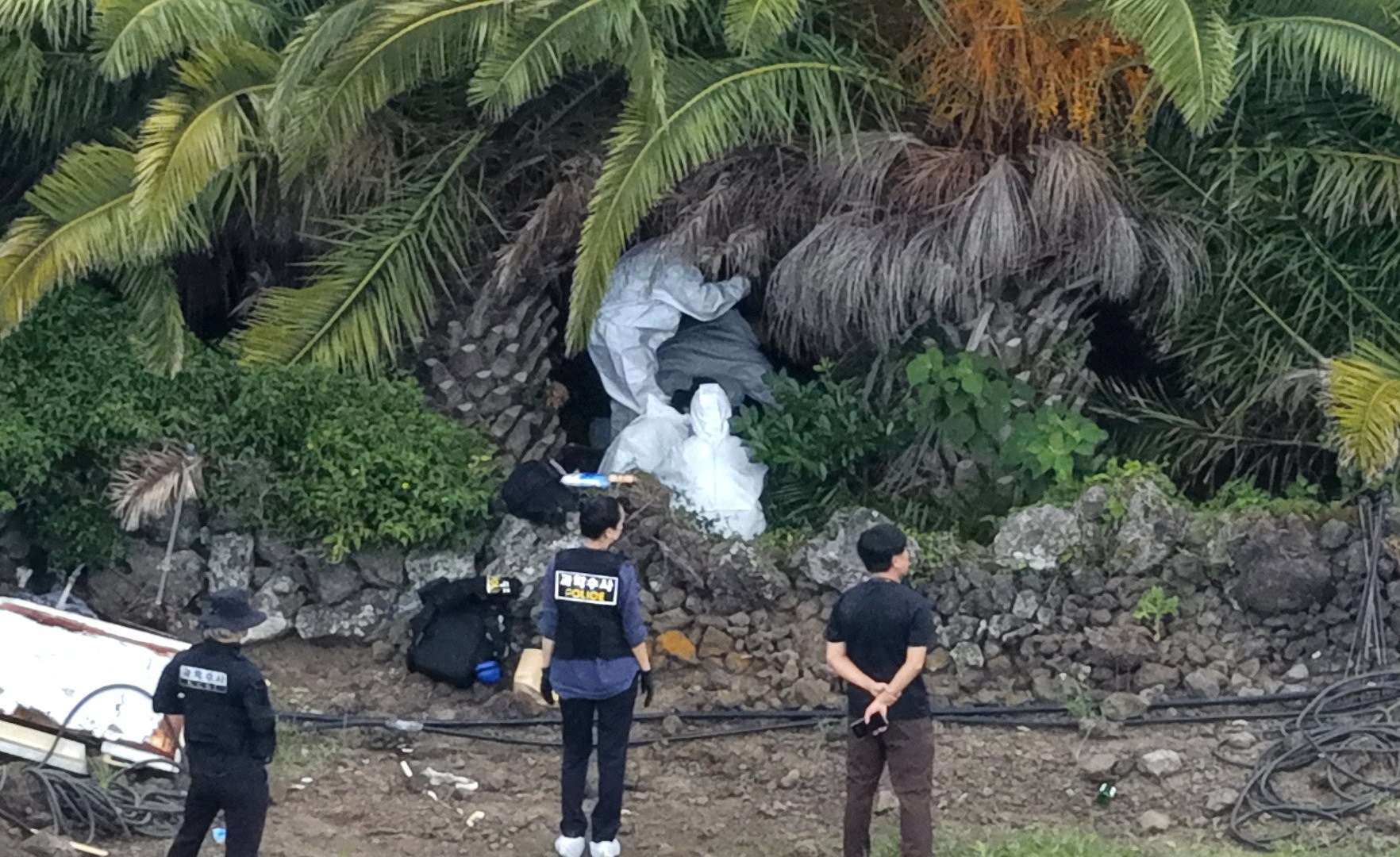 South Korean police officer arrested over bodies found on Jeju Island