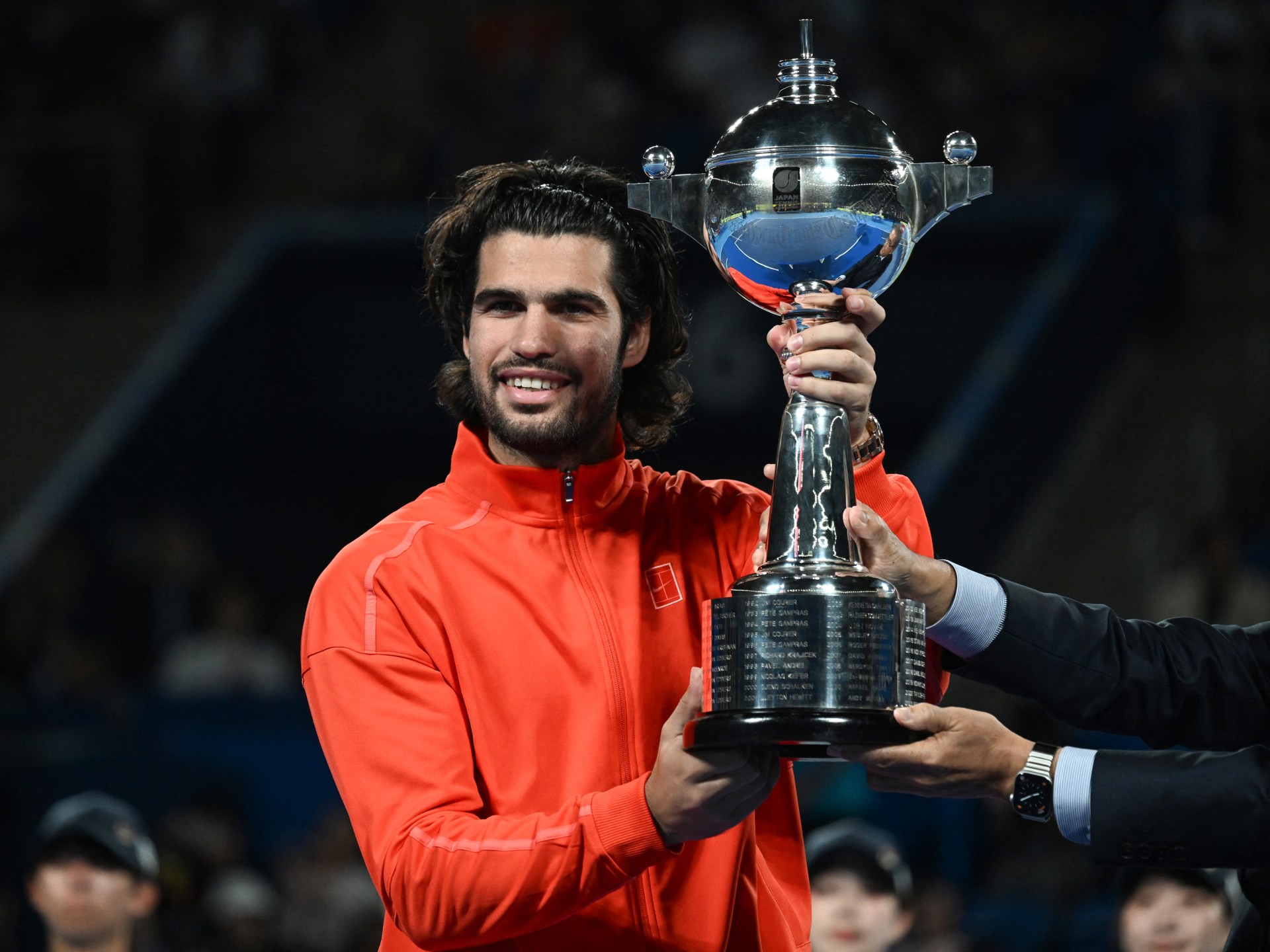 Djokovic claims China Open title as de Minaur retires from final