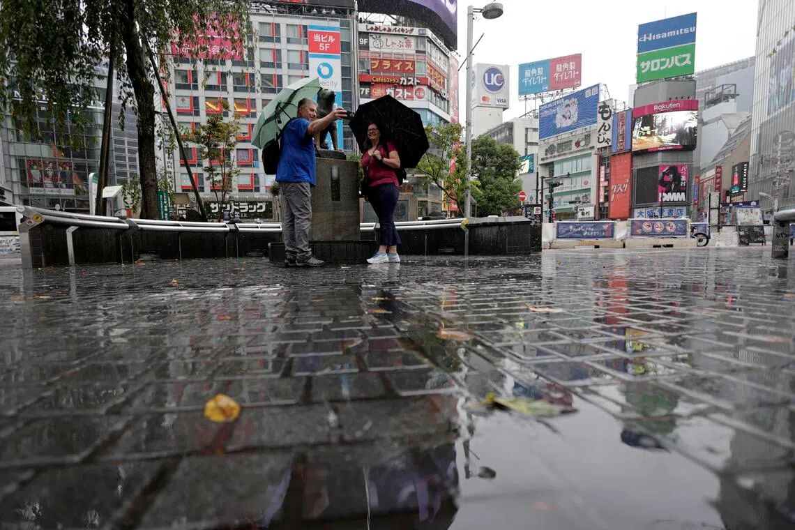 Japan braces for tropical storm as heavy rains disrupt rail services