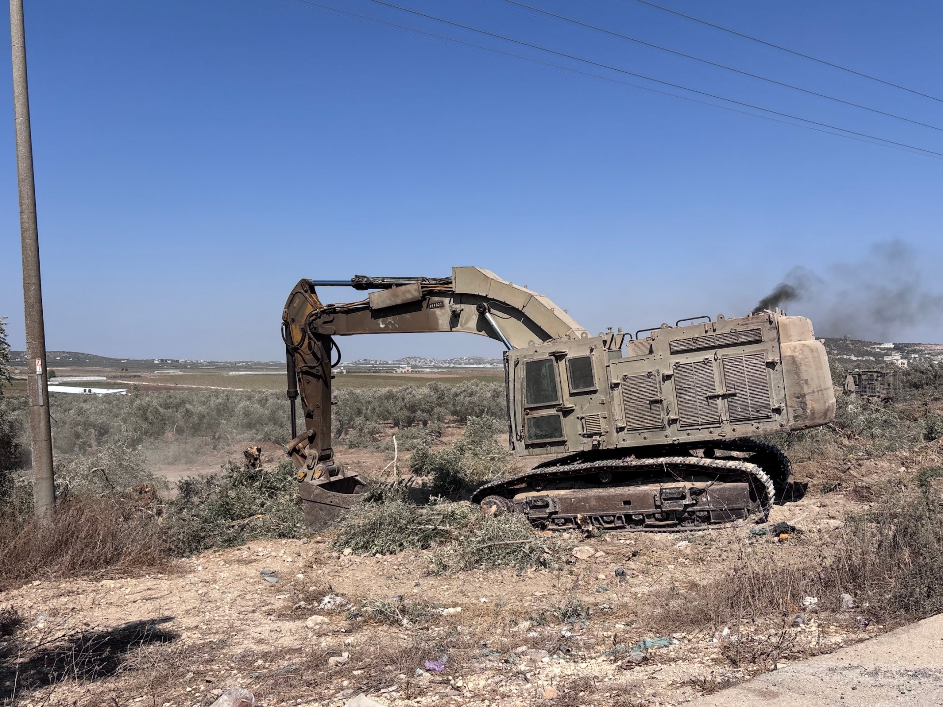 Israeli settlers raze Palestinian farmland in West Bank agricultural zone
