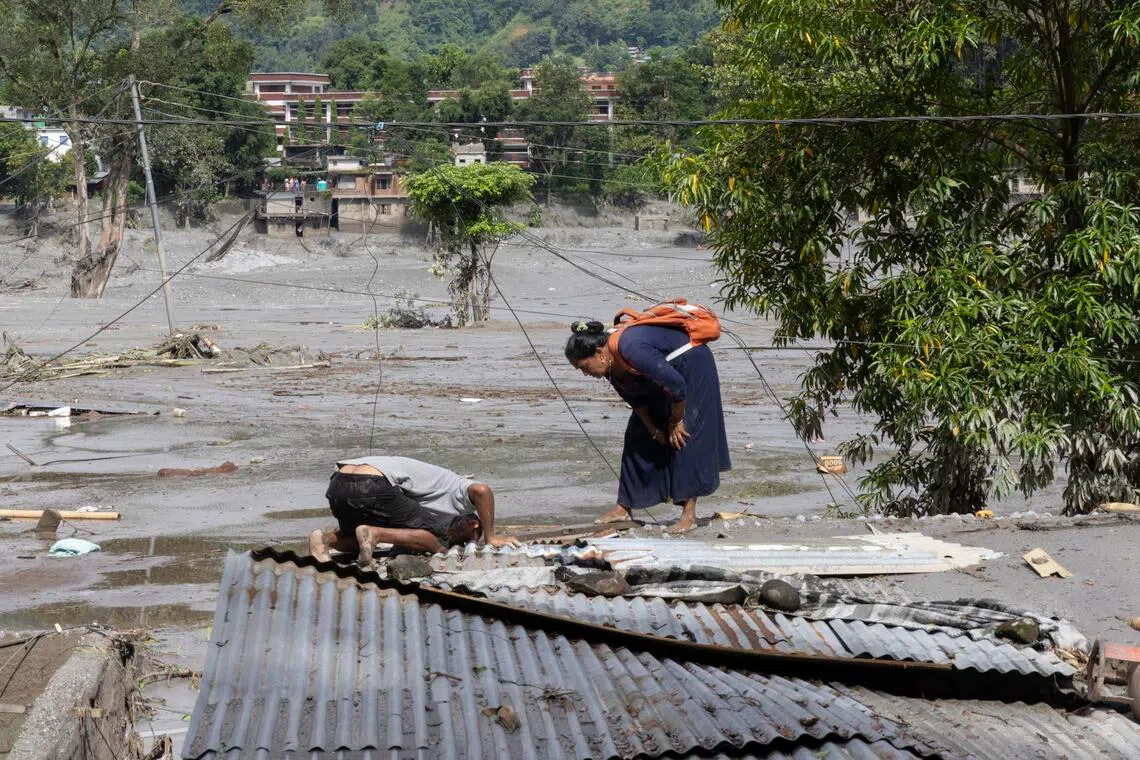 Nepalese communities reel after devastating flash floods sweep region