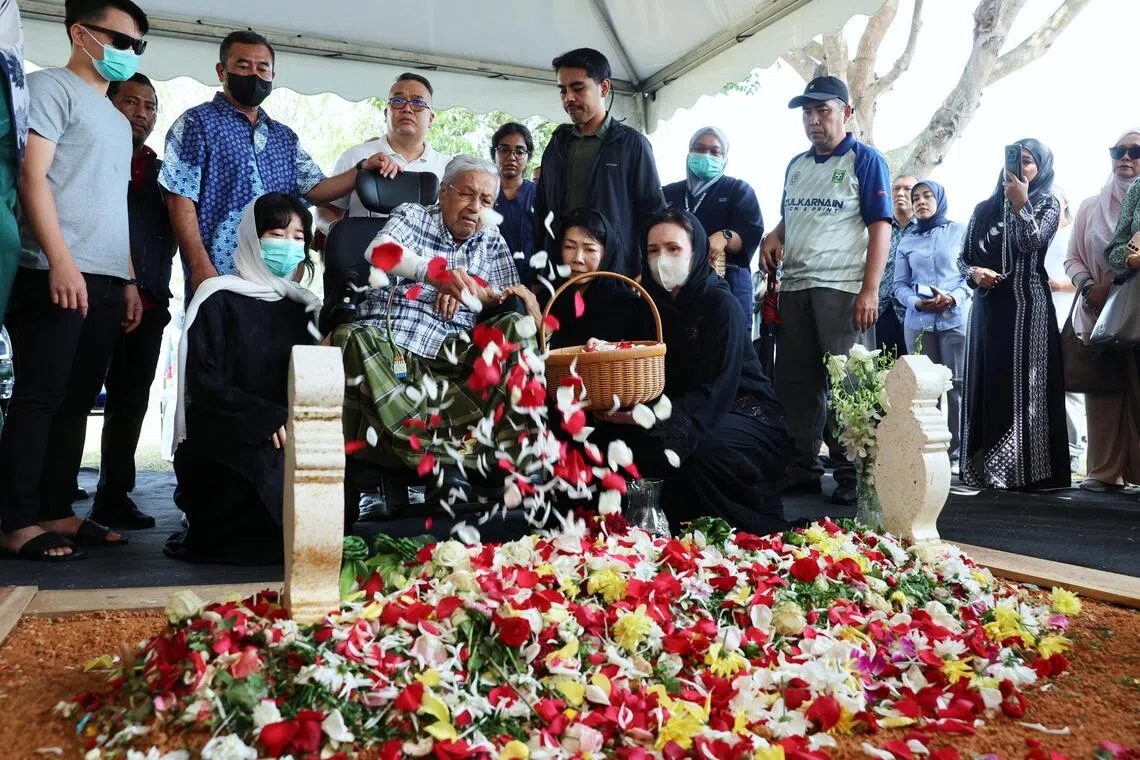 Allow Mahathir time to grieve wife's passing, son urges