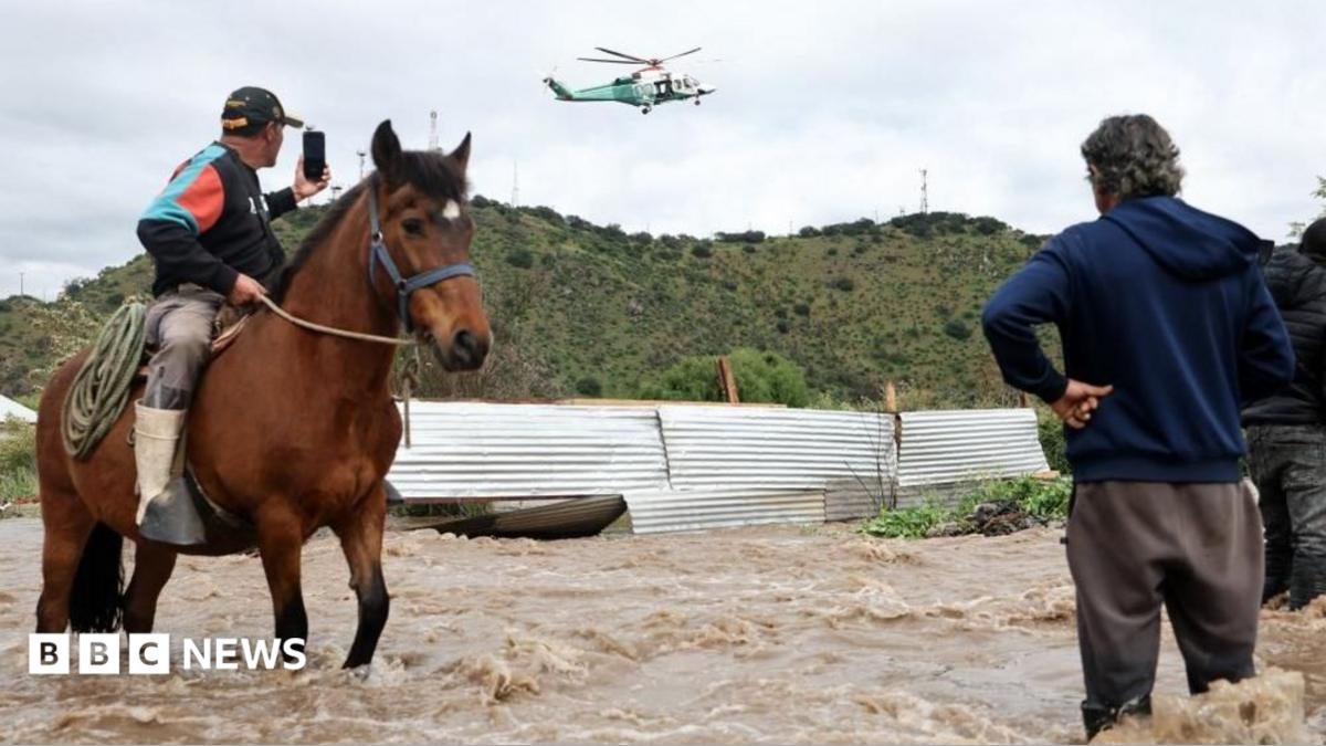 Chile evacuates residents as swollen river threatens central regions