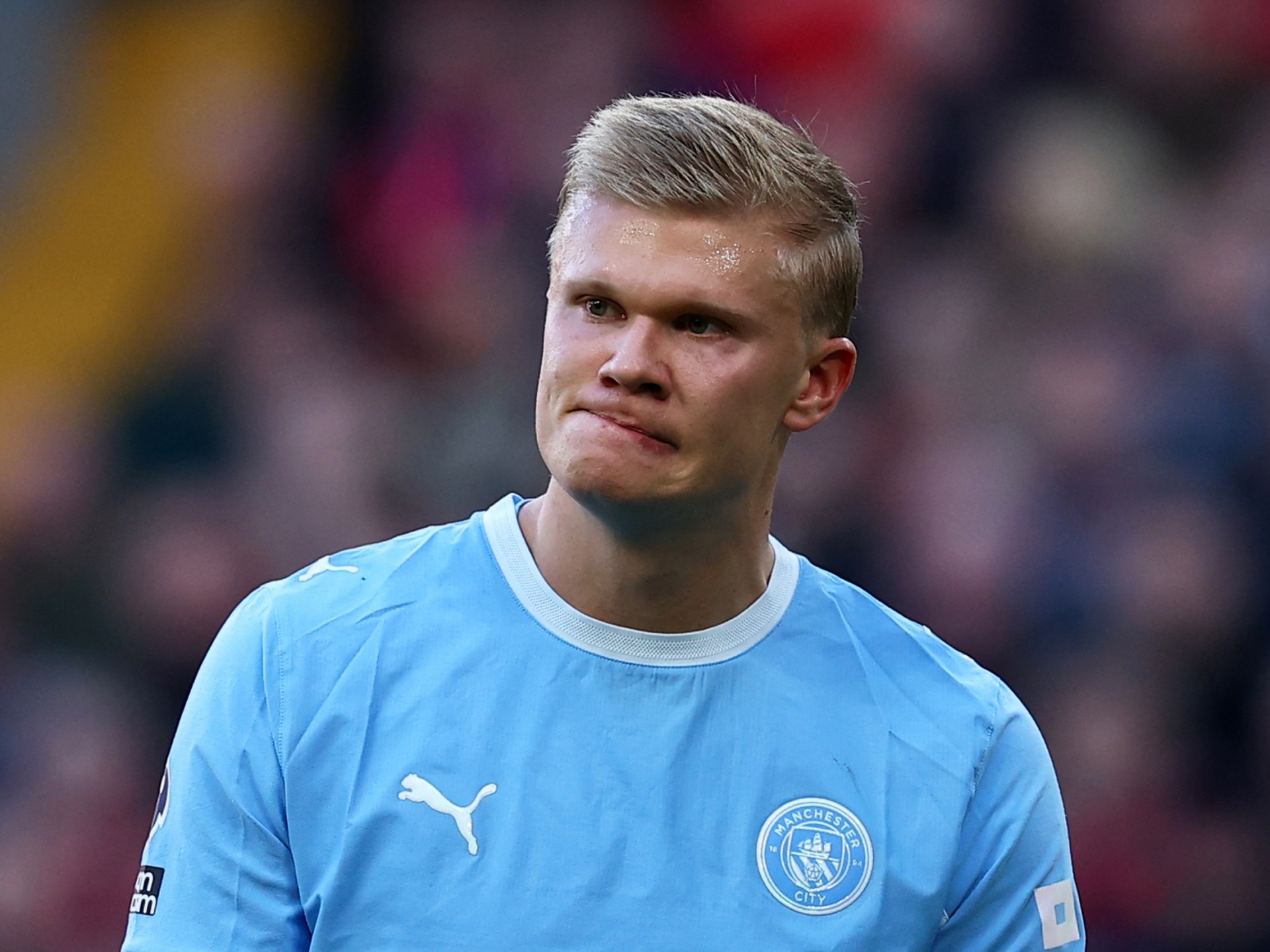 Man City edges Liverpool in tense Anfield clash amid backdrop of controversy