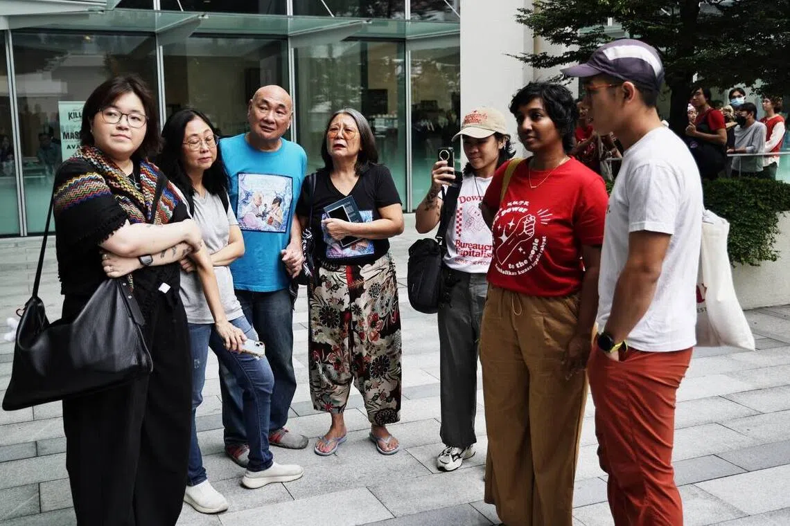 Six charged over unlawful assemblies at Changi Prison and State Courts