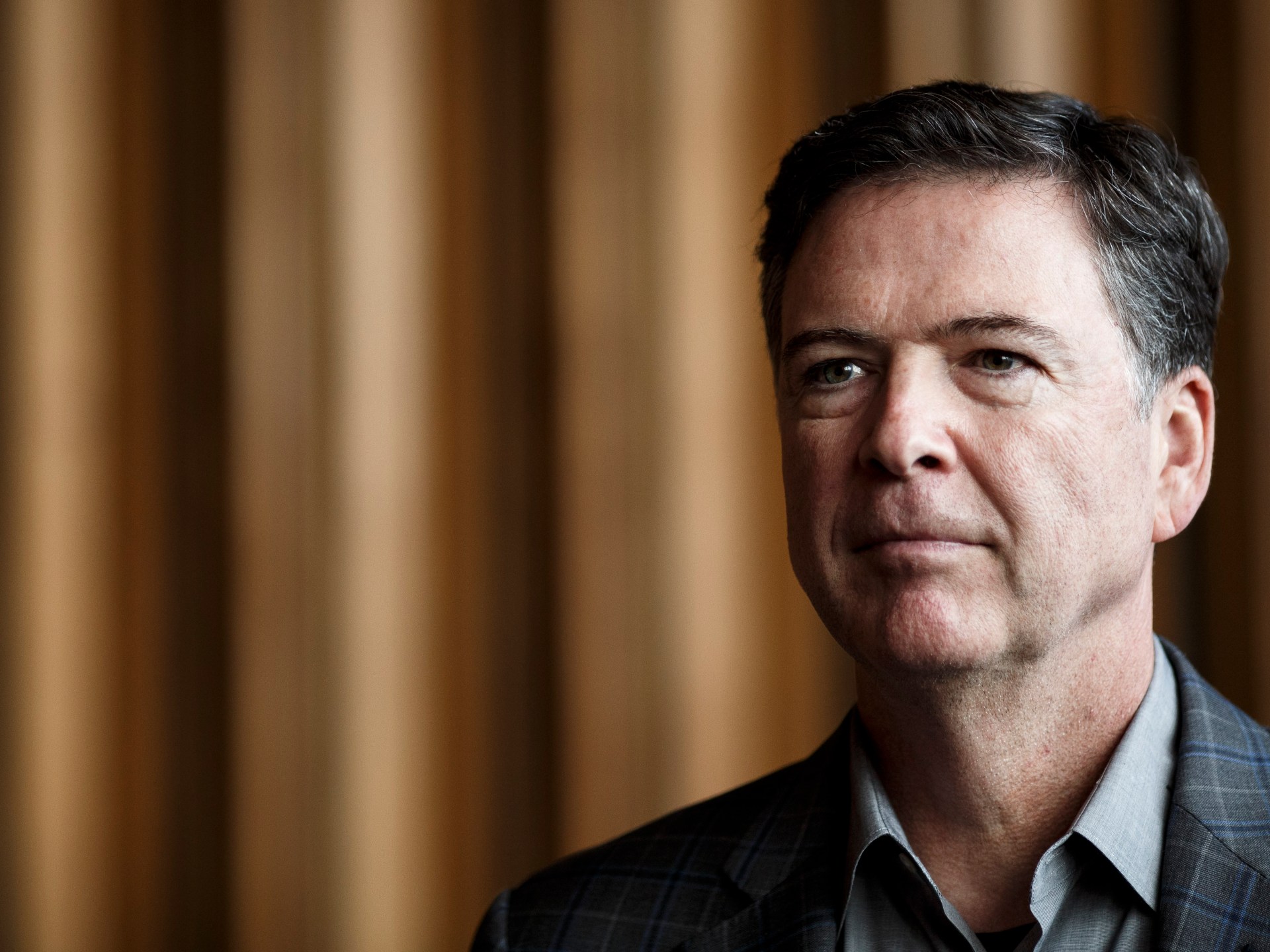 US Justice Department Defends Prosecution of Former FBI Director Comey