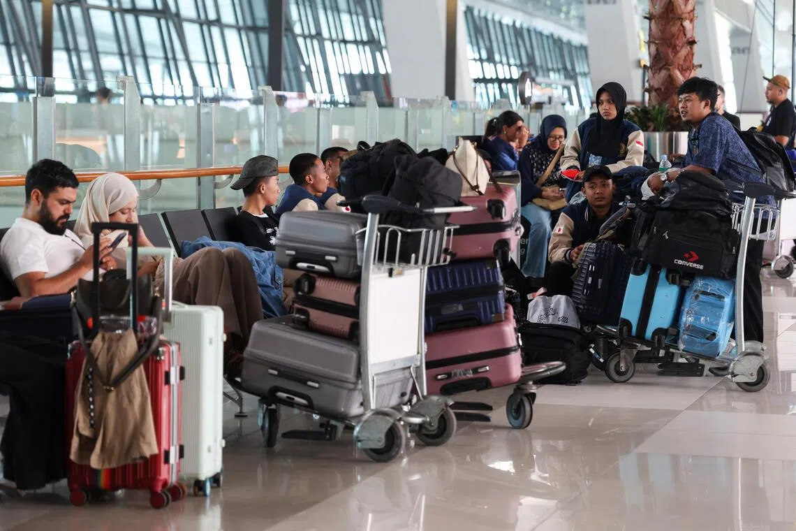 Indonesian travelers shift to buses, trains as volcano ash disrupts flights