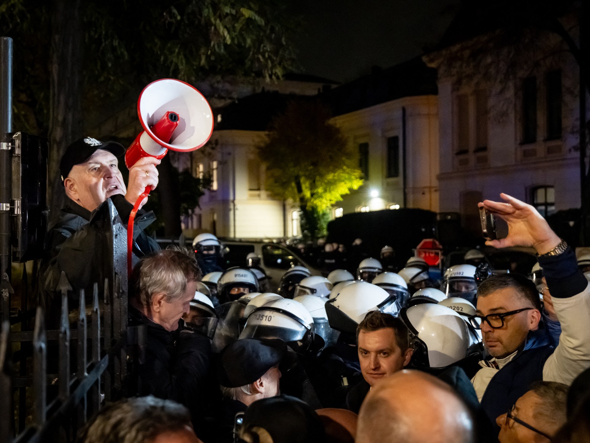 Polish police deployed to constitutional court as chief judge suspended