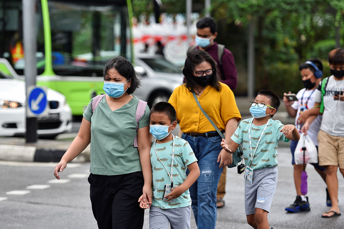 Singapore cuts infant-care costs to boost family affordability