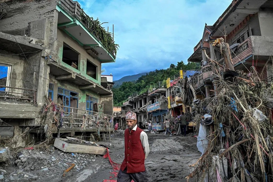Nepal flood survivors confront massive losses, uncertain recovery path