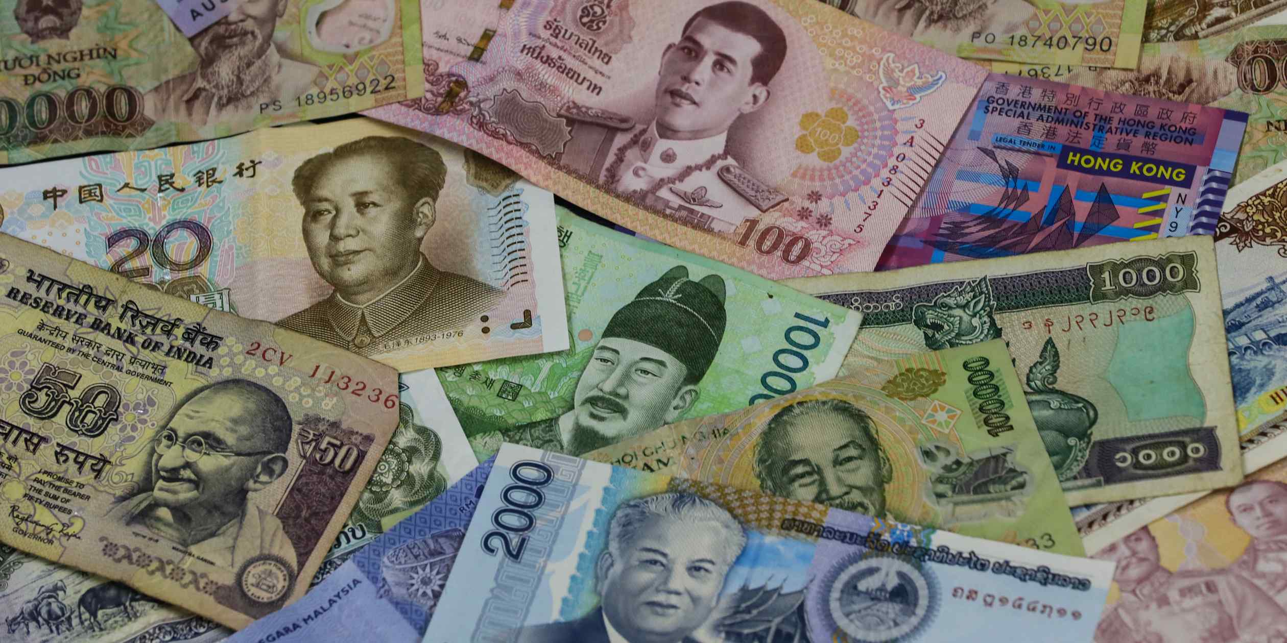 Asian currencies face headwinds from AI disruption and oil price volatility