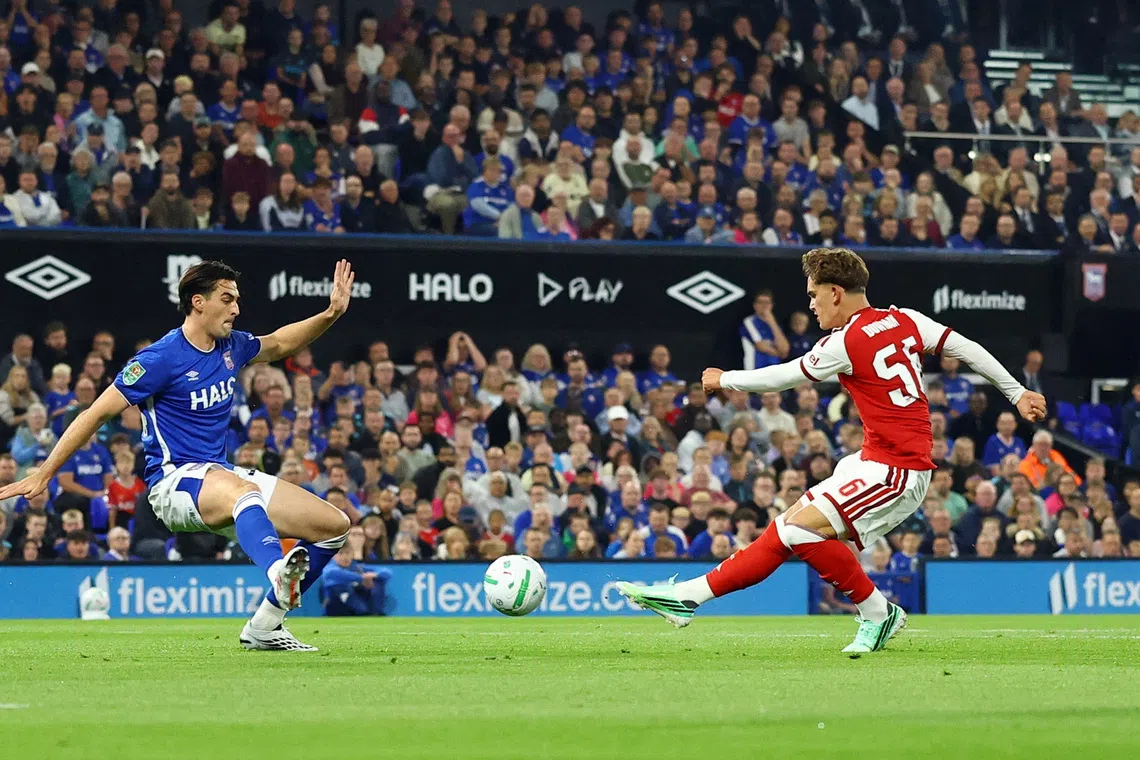 Teenage sensation Dowman fires Arsenal past Ipswich in League Cup