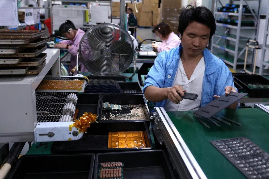 China's factory slowdown eases but services weakness clouds recovery outlook