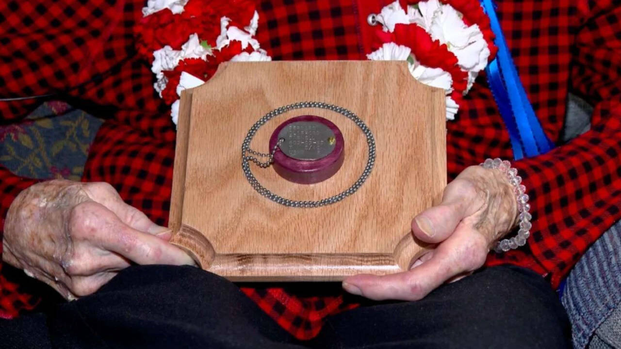 Century-old woman receives brother's WWII dog tags after 83 years