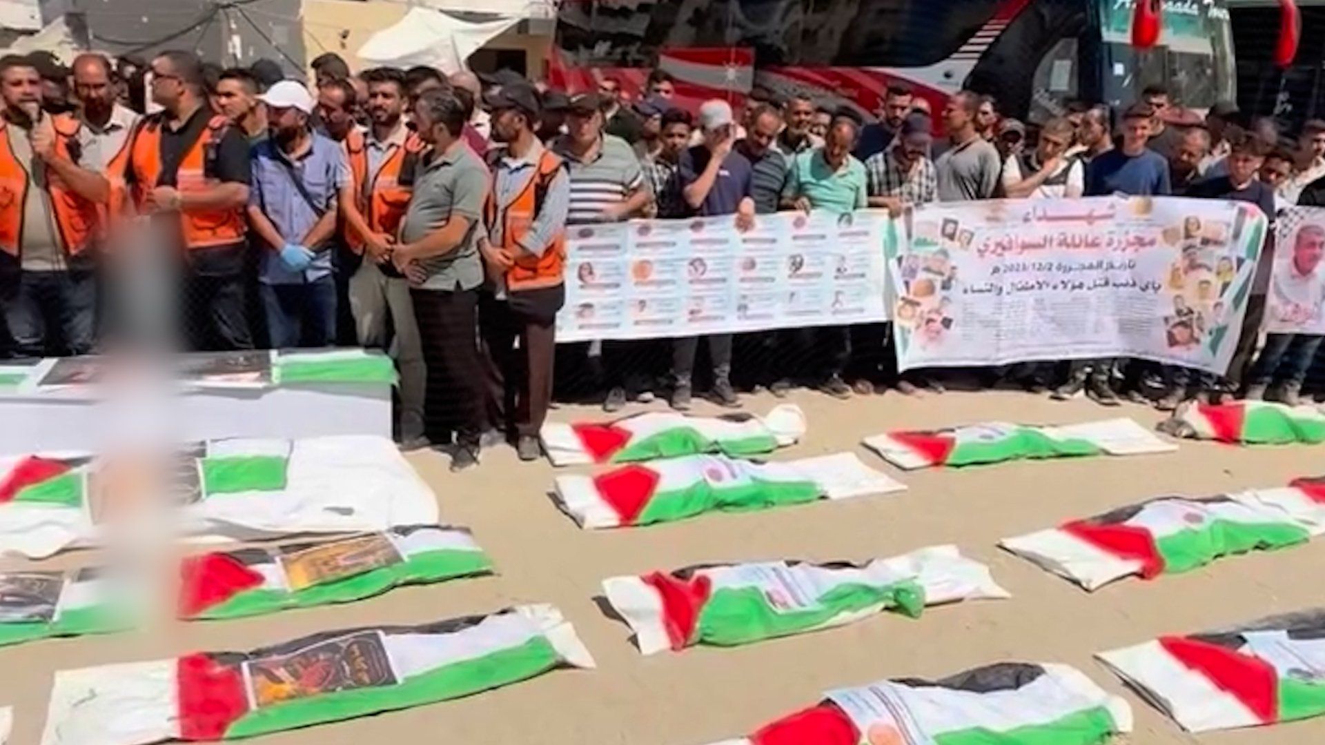 Gaza holds funeral for 50 Palestinians exhumed from rubble