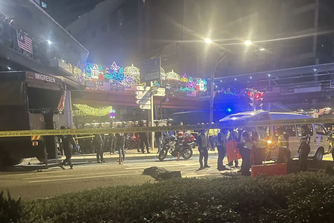 Immigration truck runs red light, kills man and two daughters in KL crash