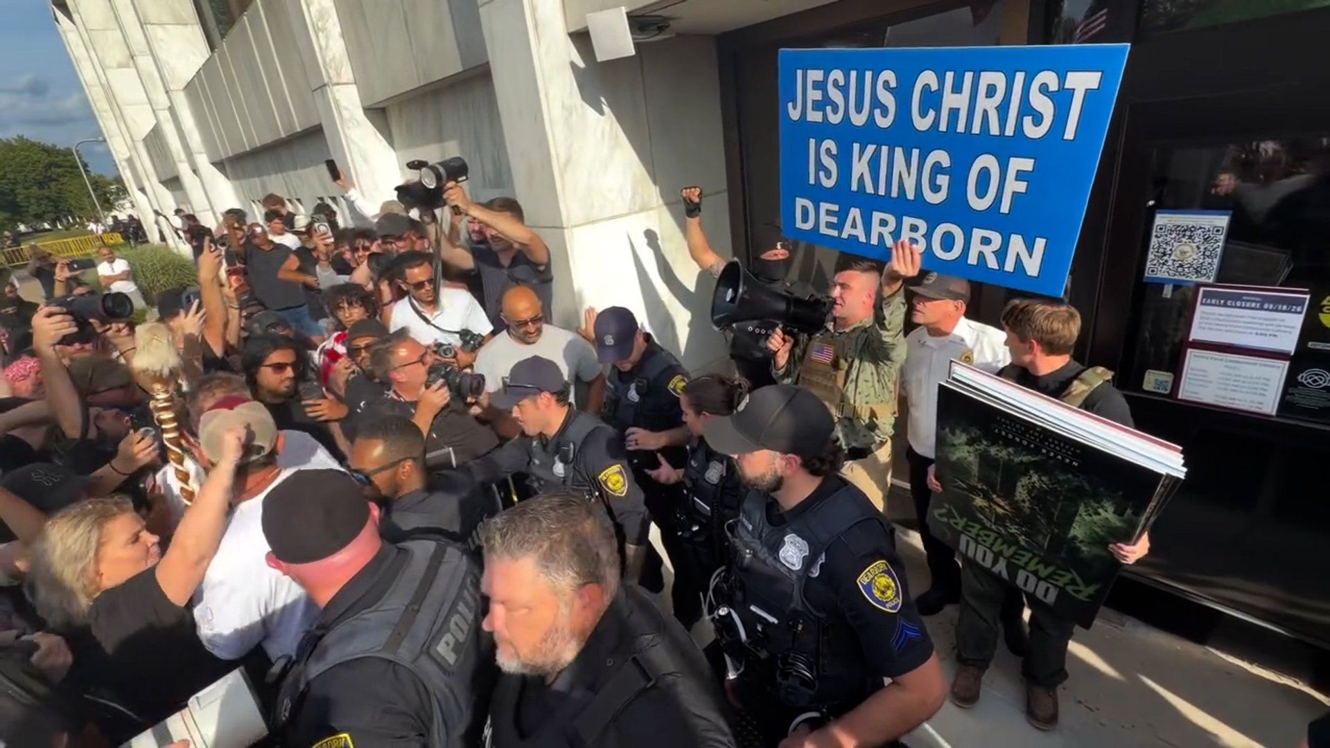 Far-right protesters clash with police at anti-Muslim rally in Michigan