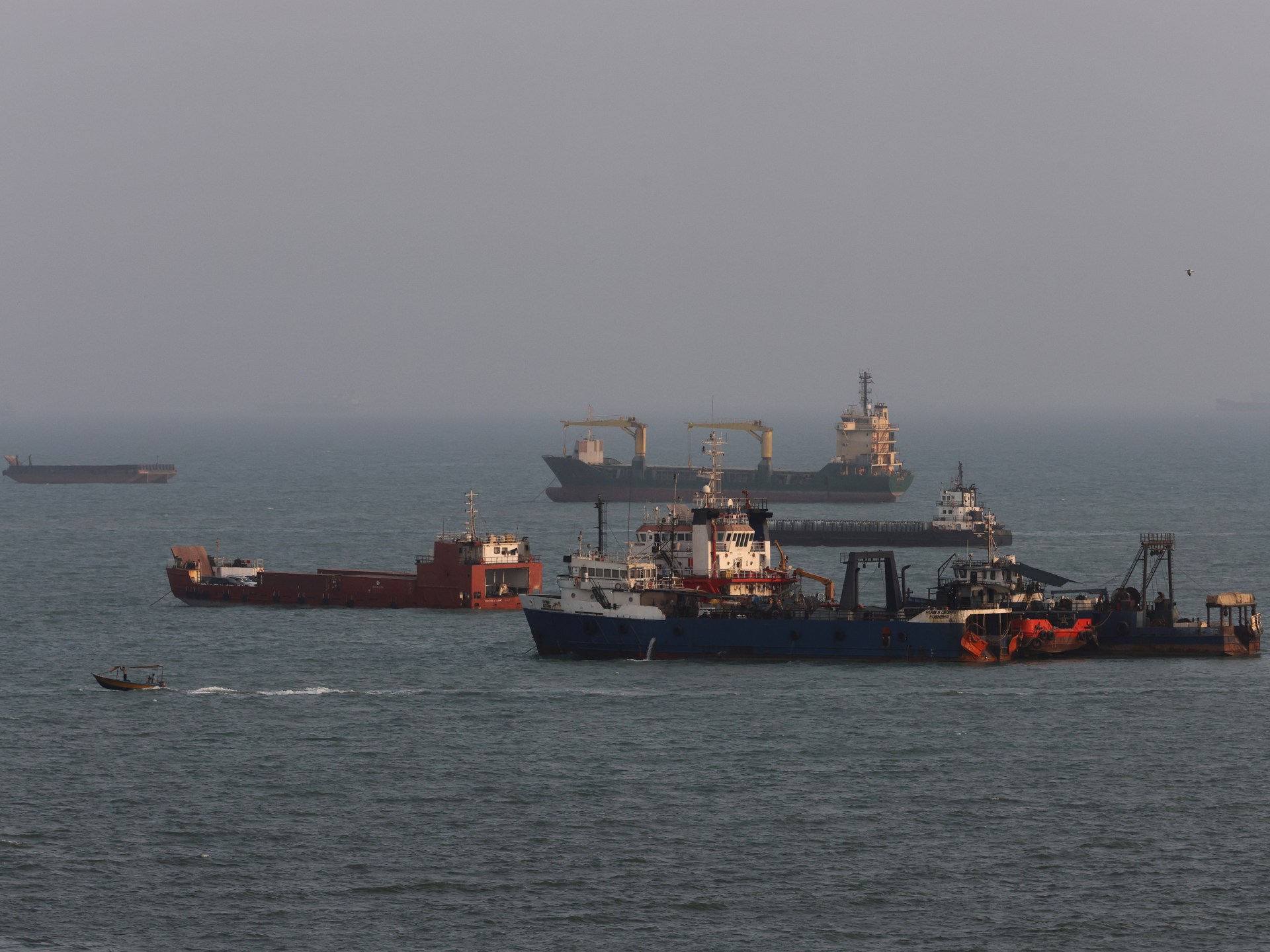 Vessel sustains damage after projectile strike in Strait of Hormuz