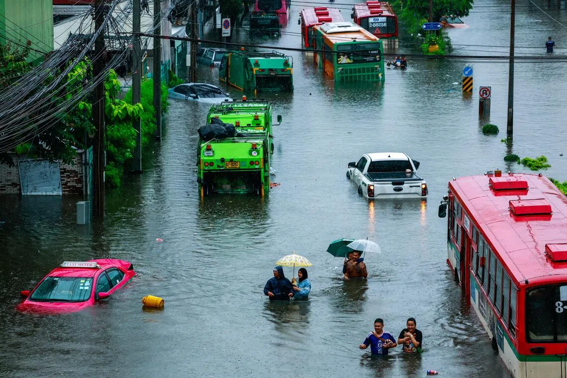 Bangkok braces for widespread flooding as storms sweep across capital