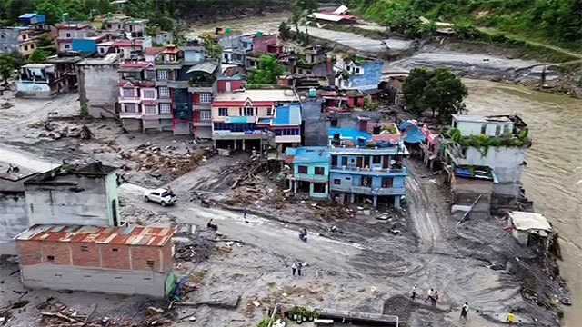 Nepal marks national mourning as flash flood death toll mounts