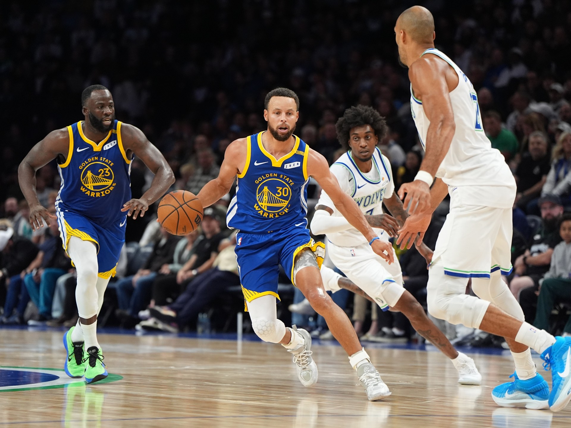 Curry leads Warriors past Timberwolves in tight NBA contest