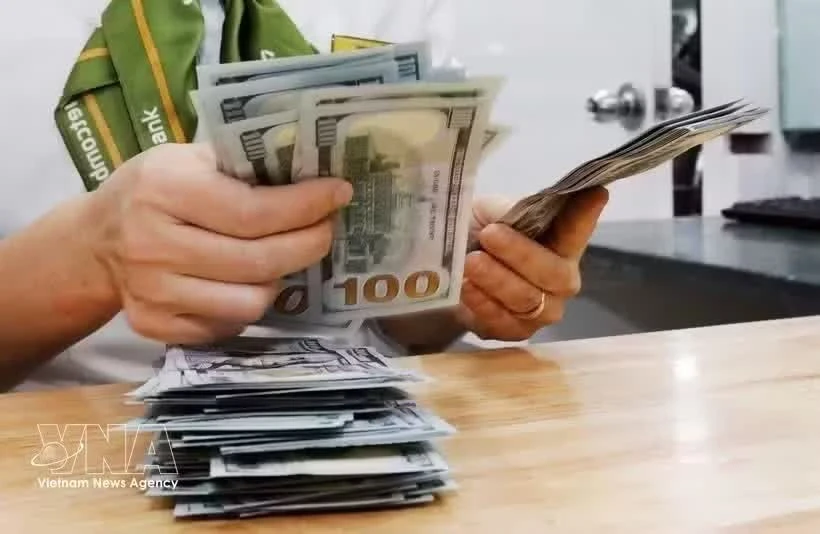 Vietnam's reference dollar rate rises 13 VND in midweek trading