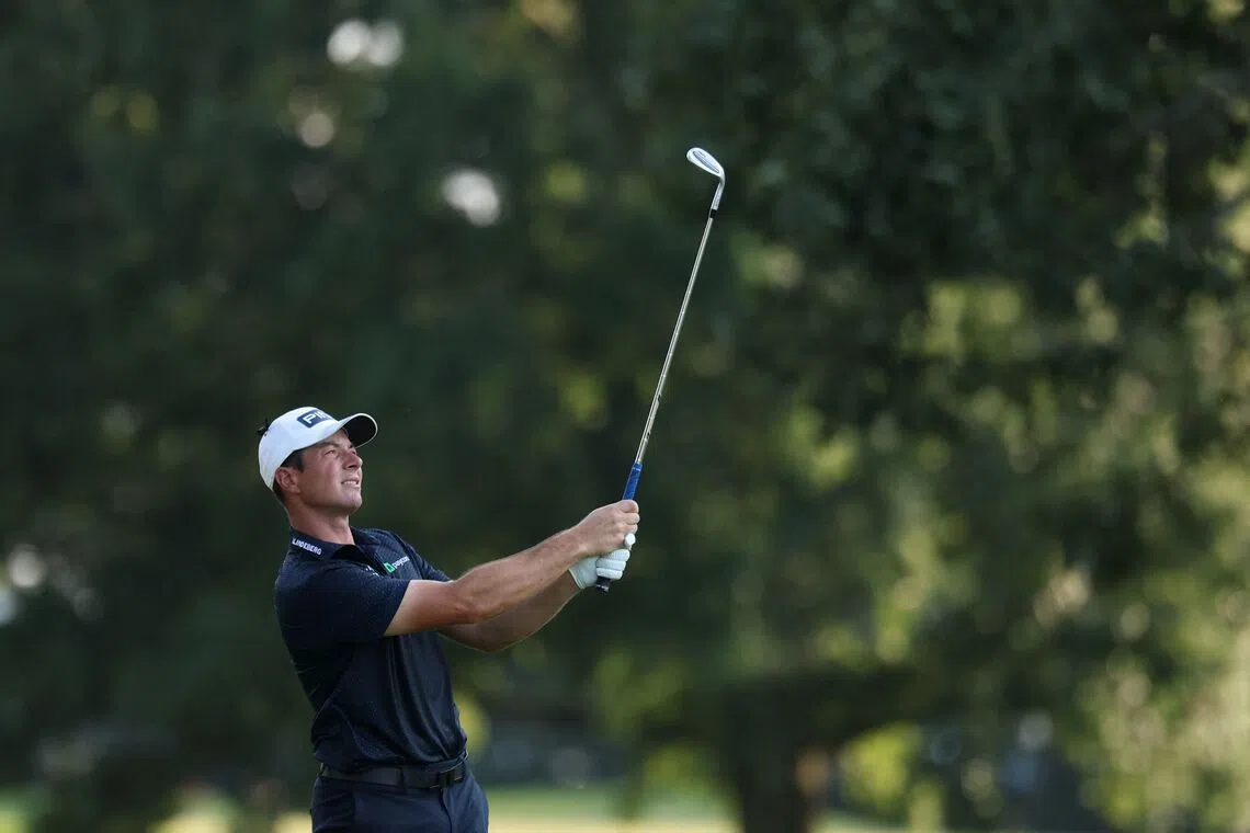 Hovland extends Tour Championship lead as McIlroy mounts late surge