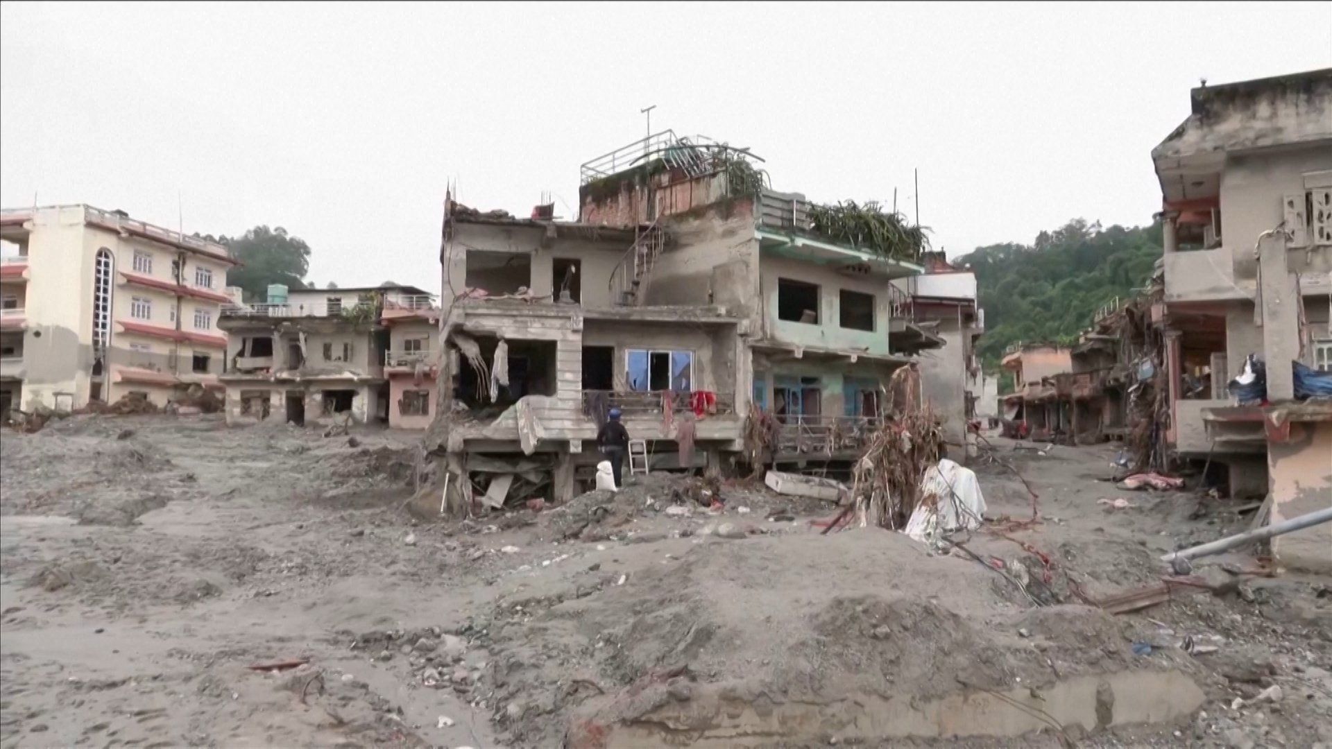 Nepali residents sift through debris as flood recovery begins