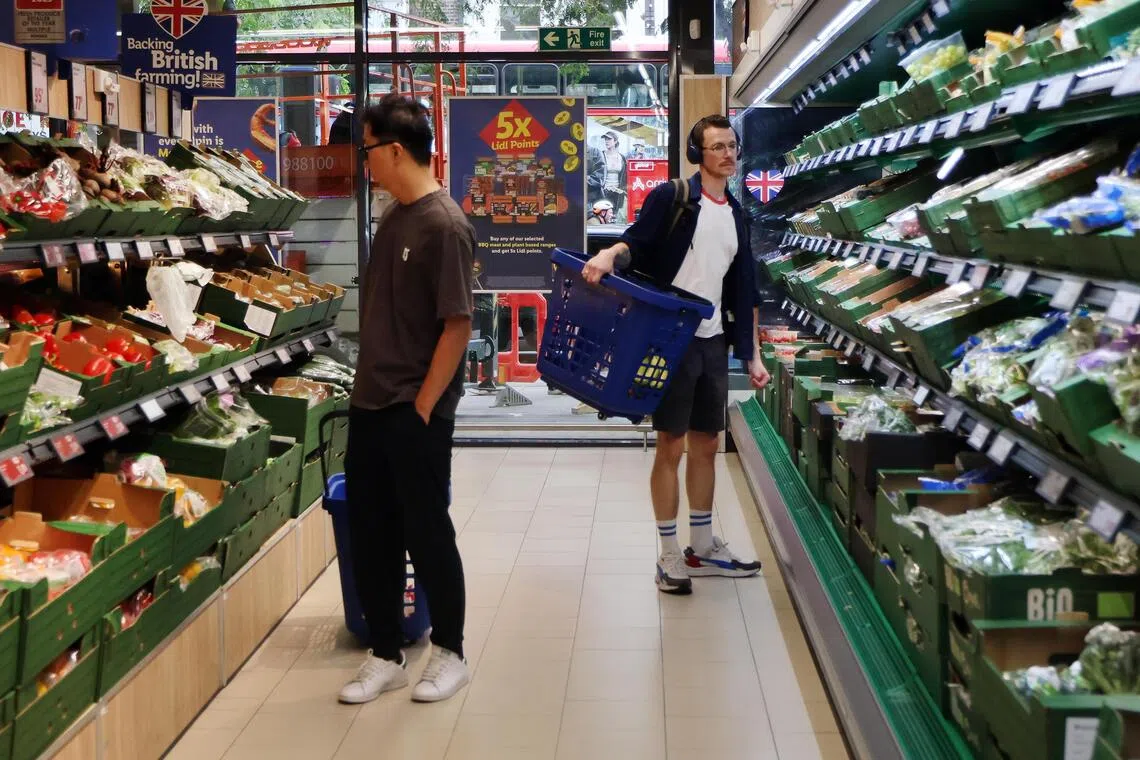 UK retail sales slip as inflation pressure returns
