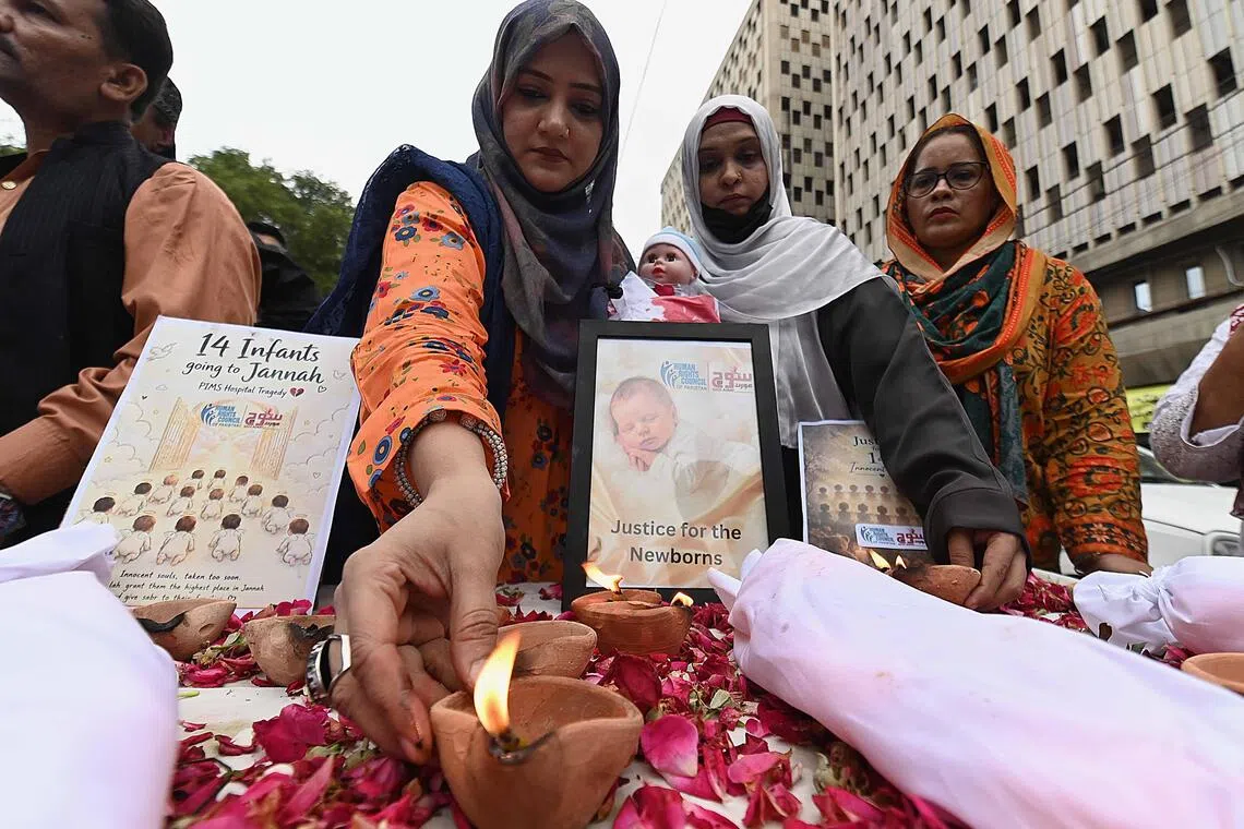 Pakistan suspends officials after four infants killed in hospital fire