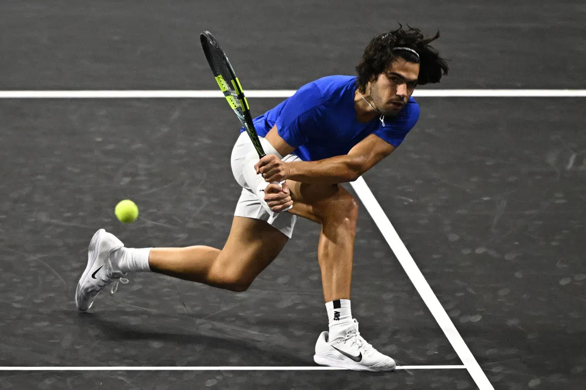 Alcaraz survives set points to advance at Japan Open