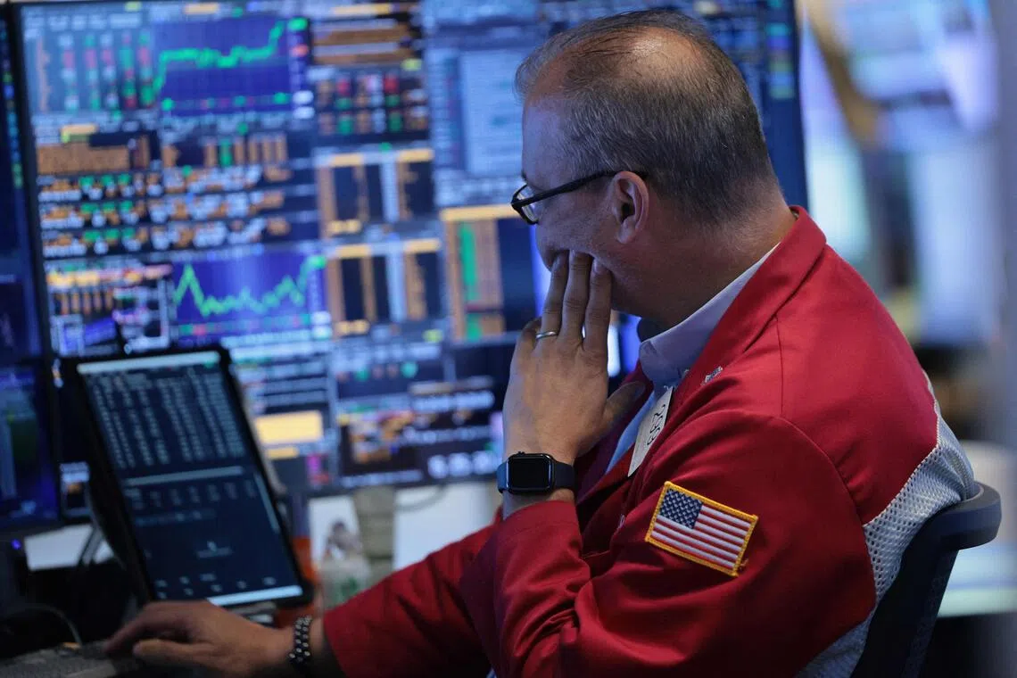 Wall Street slides as robust jobs data bolster hawkish Fed outlook