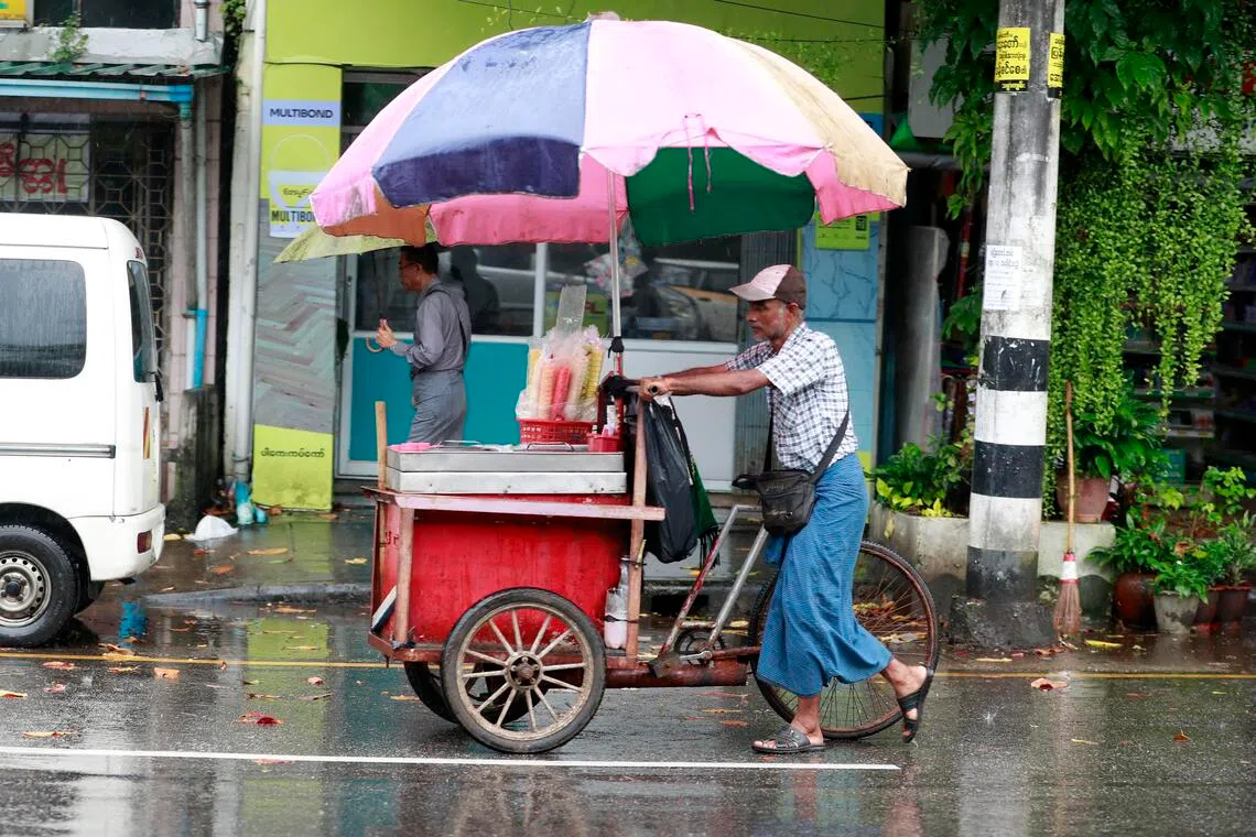 Myanmar rescuers battle to reach flood-hit region as death toll feared at 10