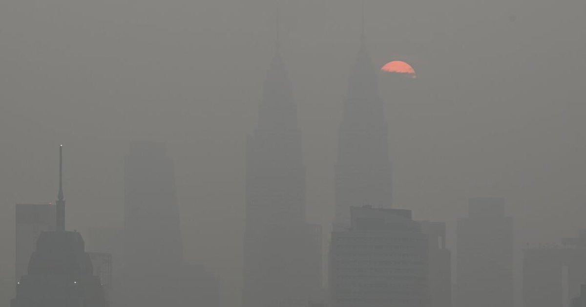 Kuala Lumpur schools open despite haze, outdoor activities halted