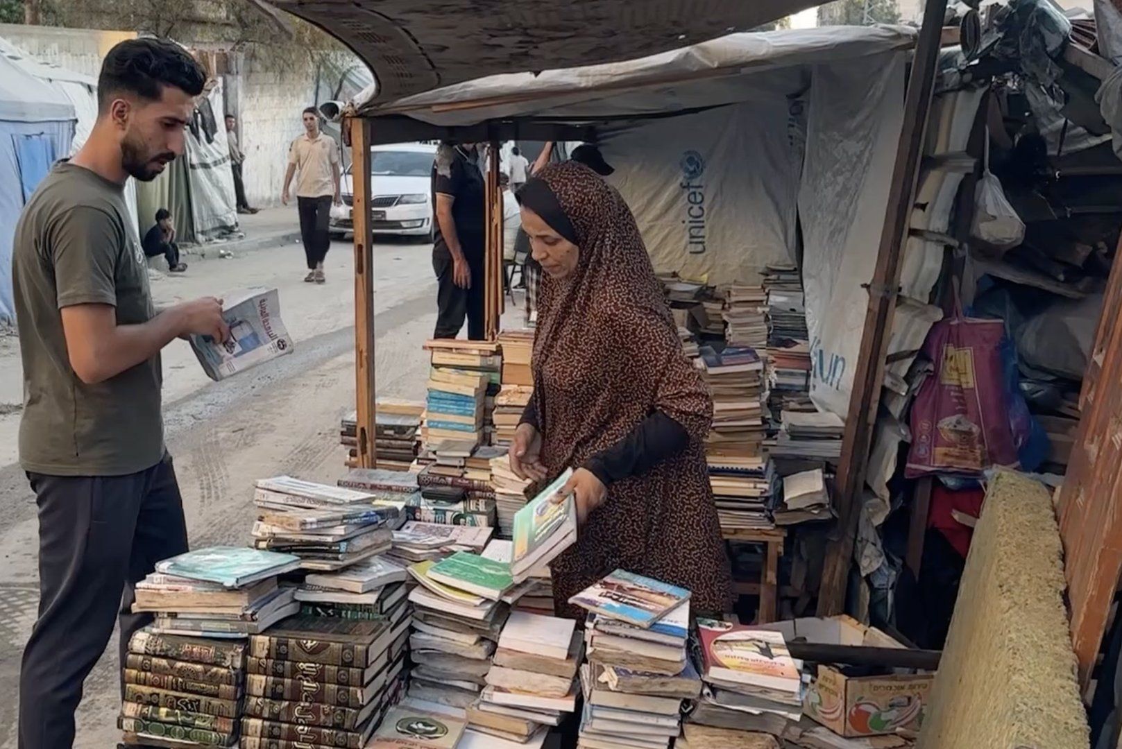 Gaza educator salvages books from ruins to preserve learning