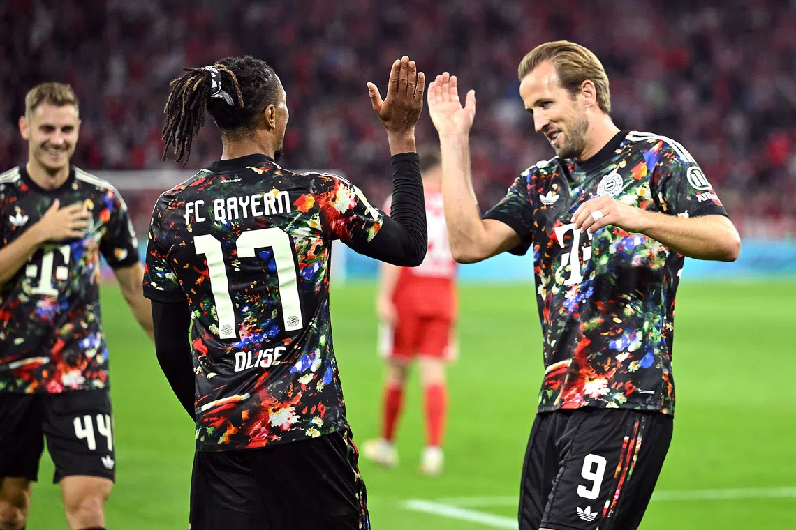 Kane's record and Olise's treble lift Bayern to summit with 7-0 rout