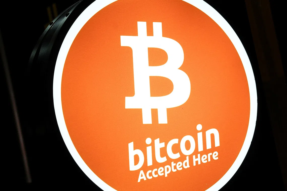 Bitcoin slides on Fed rate hike concerns, steadies near $76,000