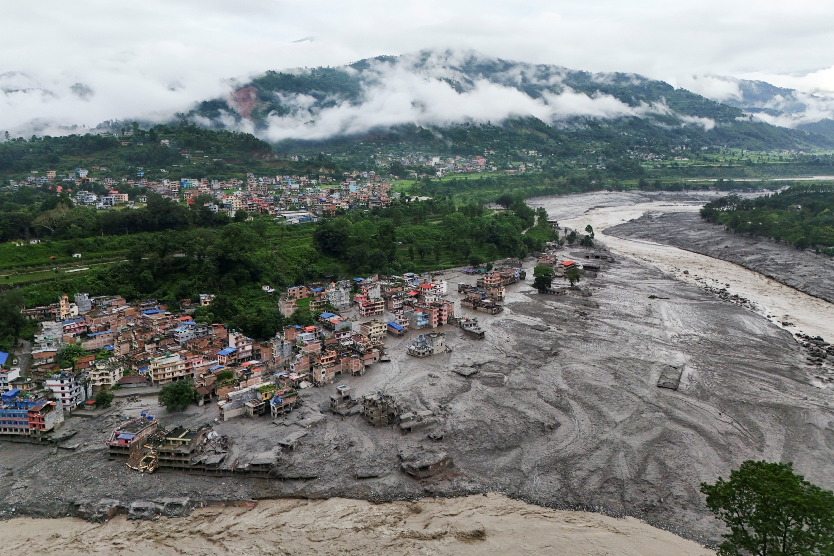 Nepal-Tibet floods leave 160 dead, hundreds unaccounted for