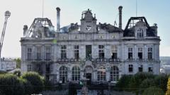France's divided nation reflected in charred Limoges town hall ruins