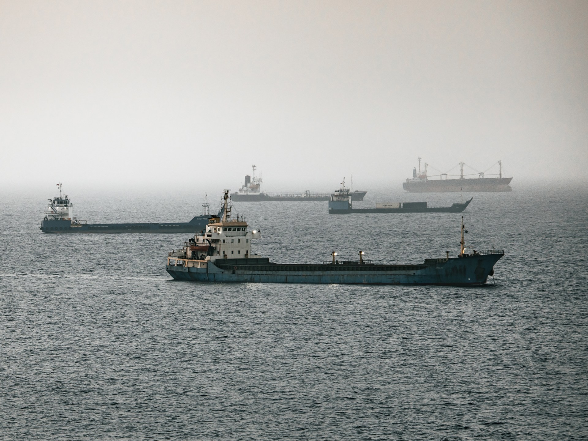 Iran claims seven ships damaged in Strait of Hormuz, threatens wider retaliation