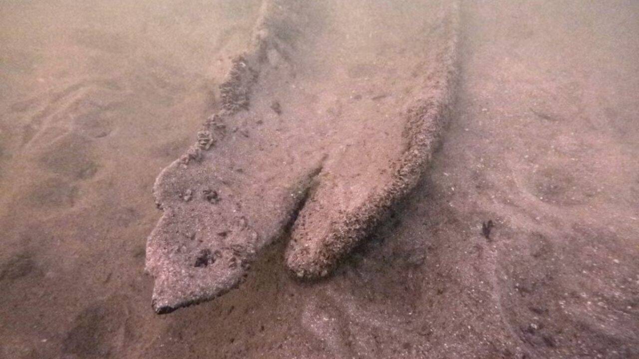 Wisconsin diver unearths 1,000-year-old dugout canoe from lake bed