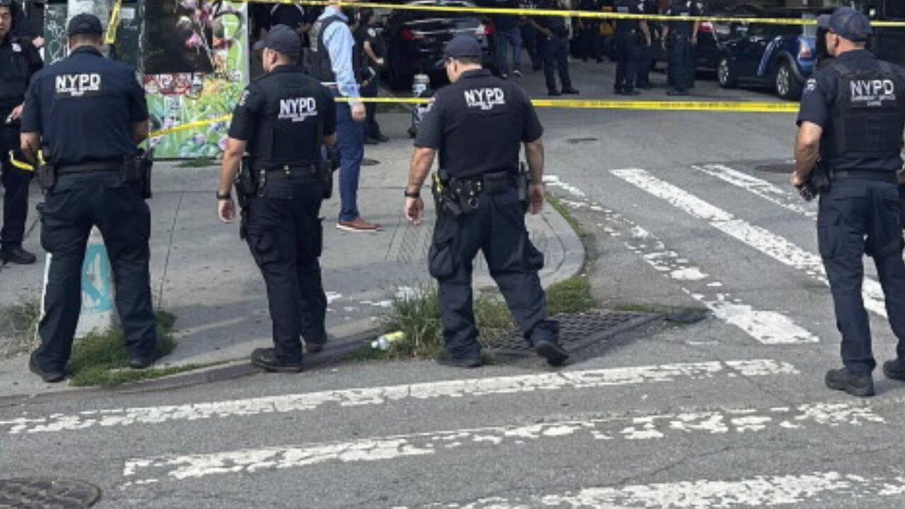Four stabbed, woman shot by police at New York residence