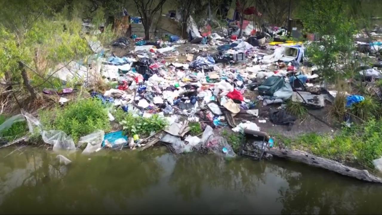 Community volunteers clear 43,000 pounds of waste from illegal dumping site