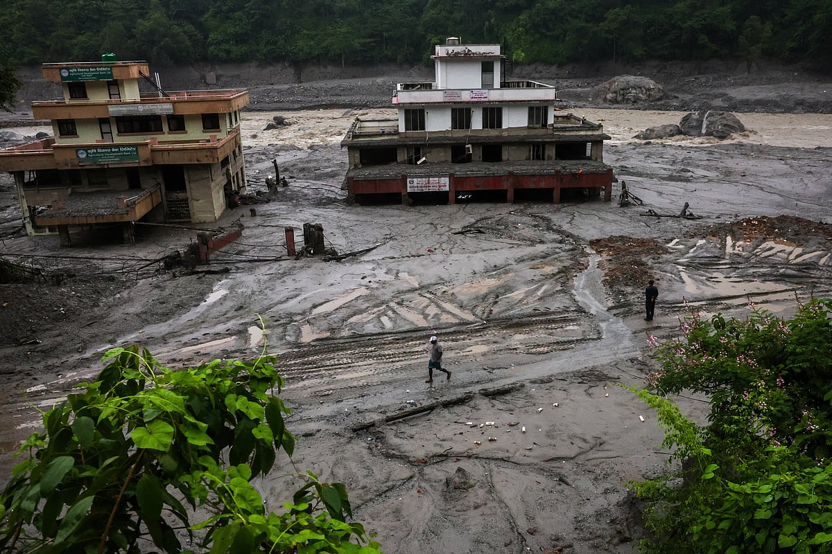 Death toll climbs as Nepal, China battle devastating monsoon flooding