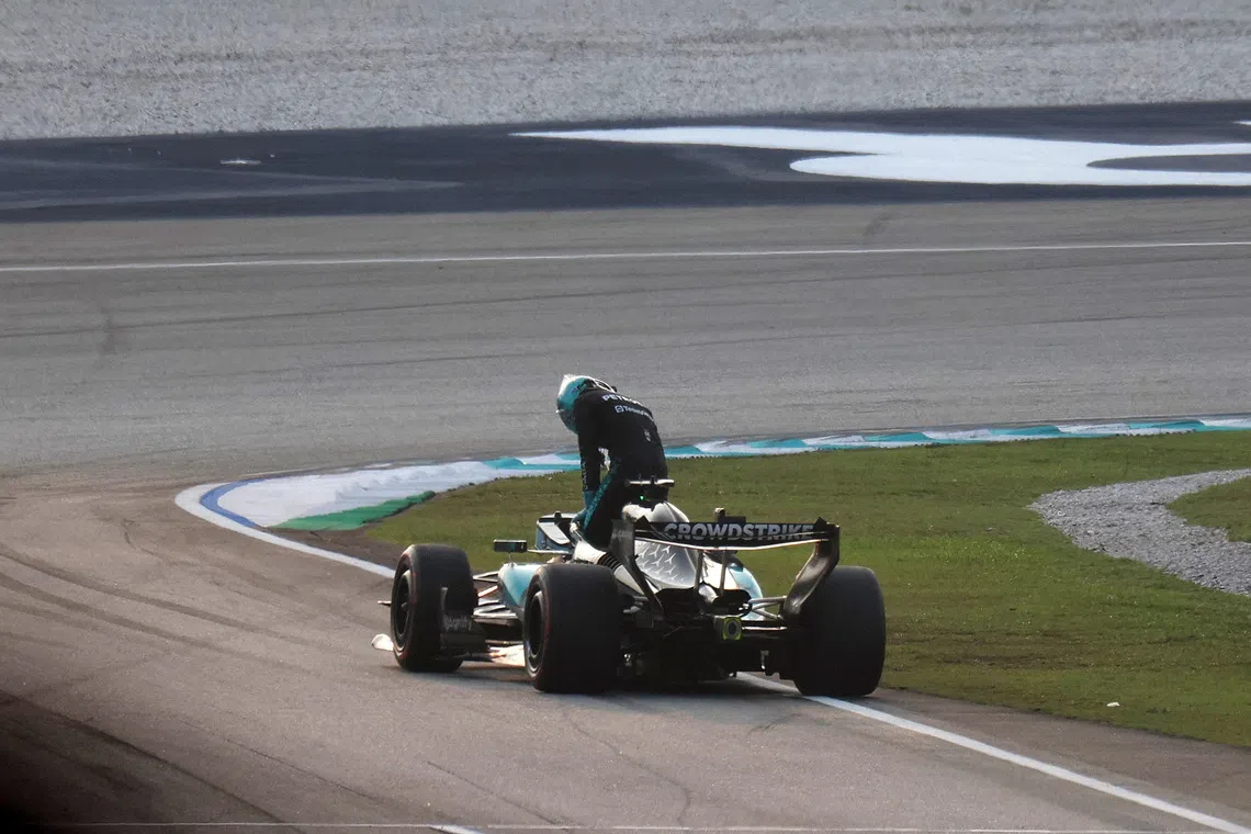 Russell's title bid derailed by engine failure at Sepang