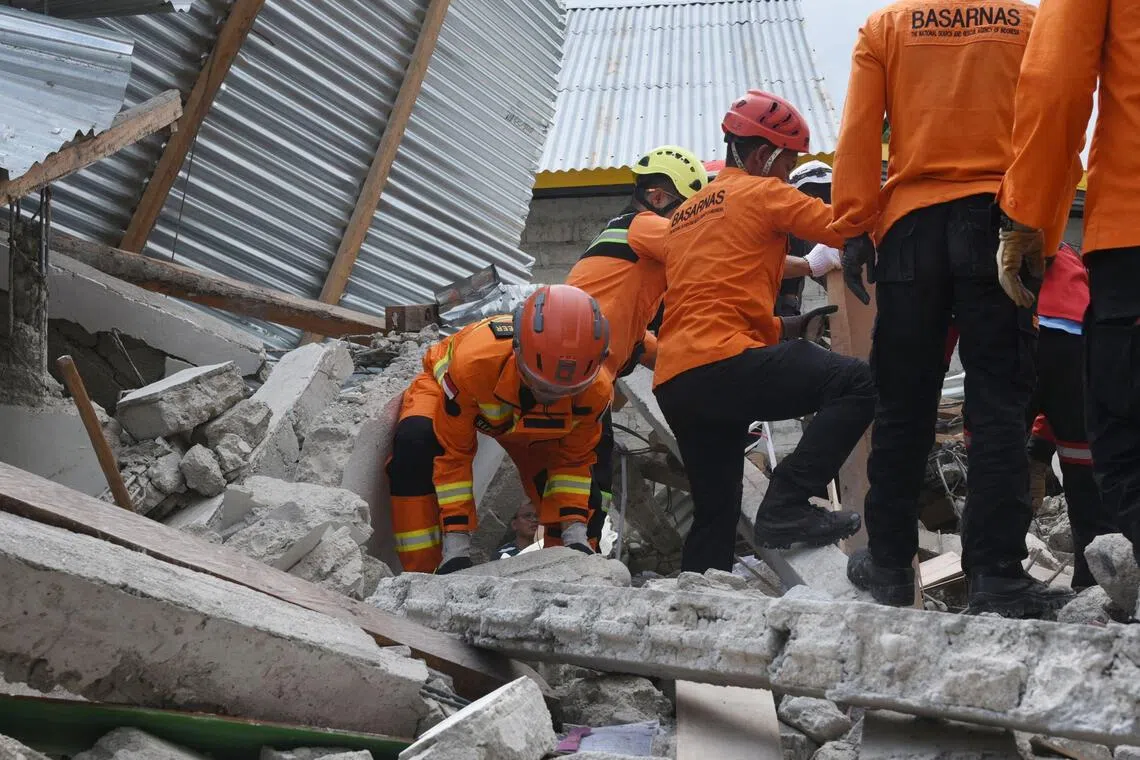 Elderly Indonesian woman rescued alive days after devastating earthquake