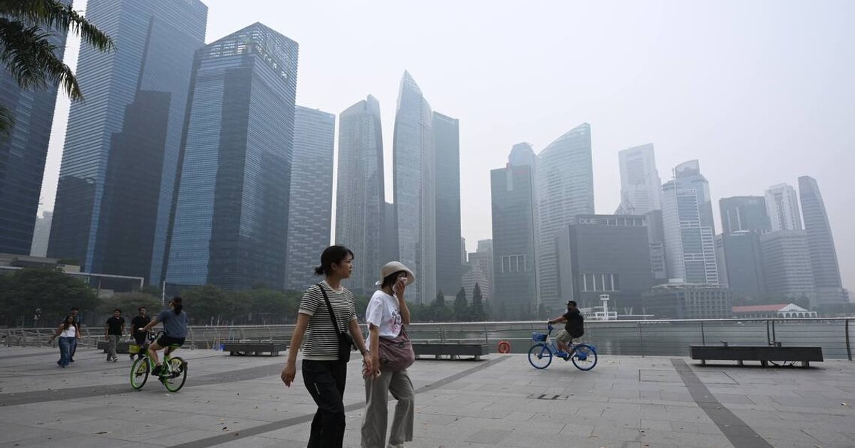 Three Singapore firms pledge cooperation after receiving haze law notices