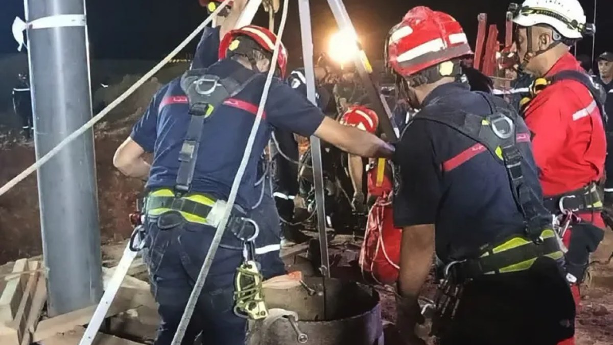 Algerian rescue teams recover body of boy from well after four days