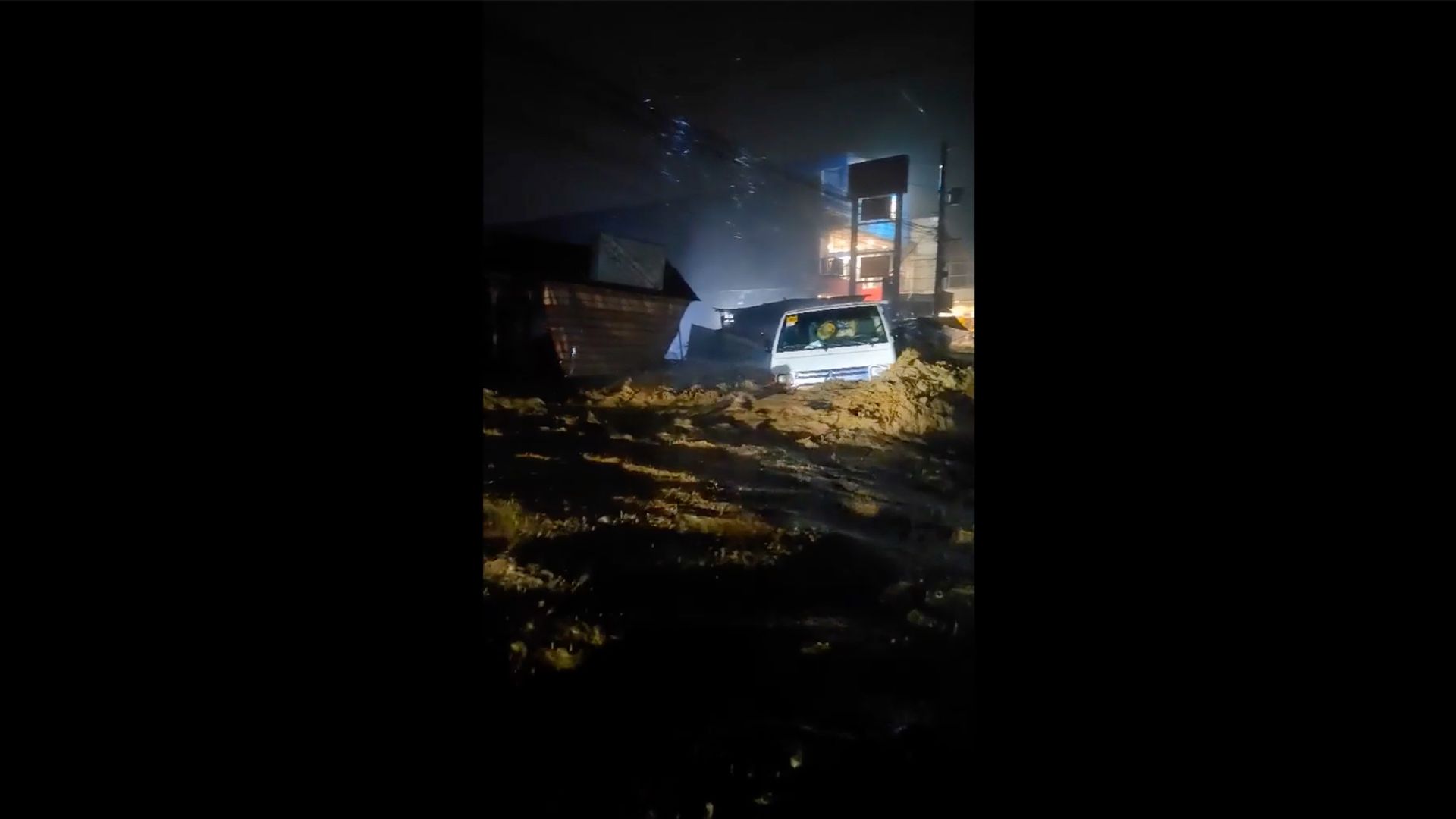 Truck swept away as torrential rains batter Philippines