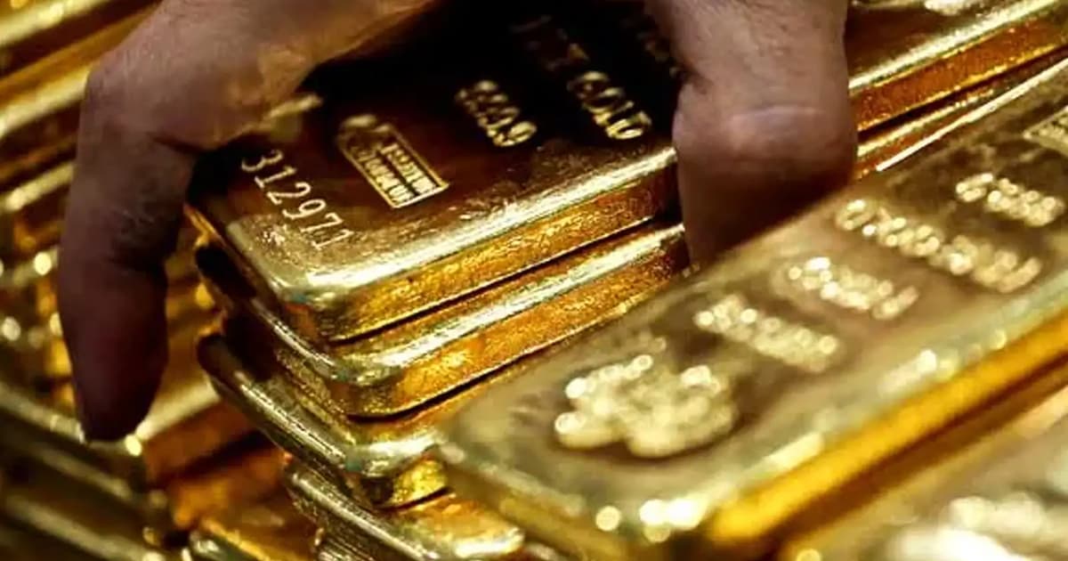 Gold holds firm near three-month peak amid currency concerns